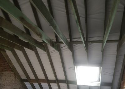 Niew dak met nieuw kapgebinte en sarkingisolatie - Kortrijk