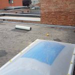 Renovatie plat dak met koepels